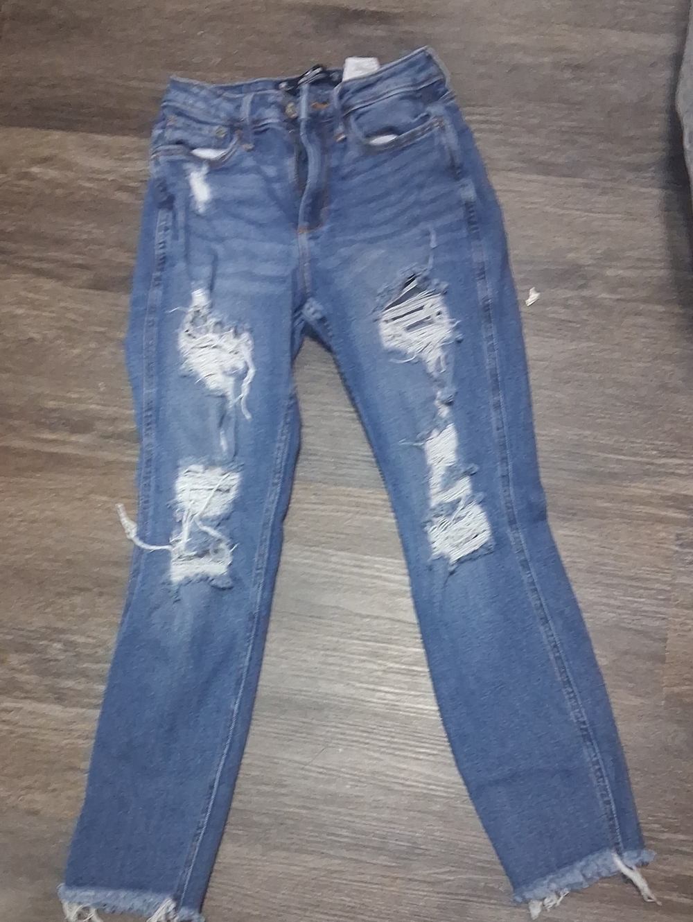 Hollister Women's Distressed Skinny Jeans in Blue